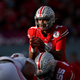 C.J. Stroud of the Ohio State Buckeyes awaits the snap against the Utah Utes during the first half of the Rose Bowl game in January.